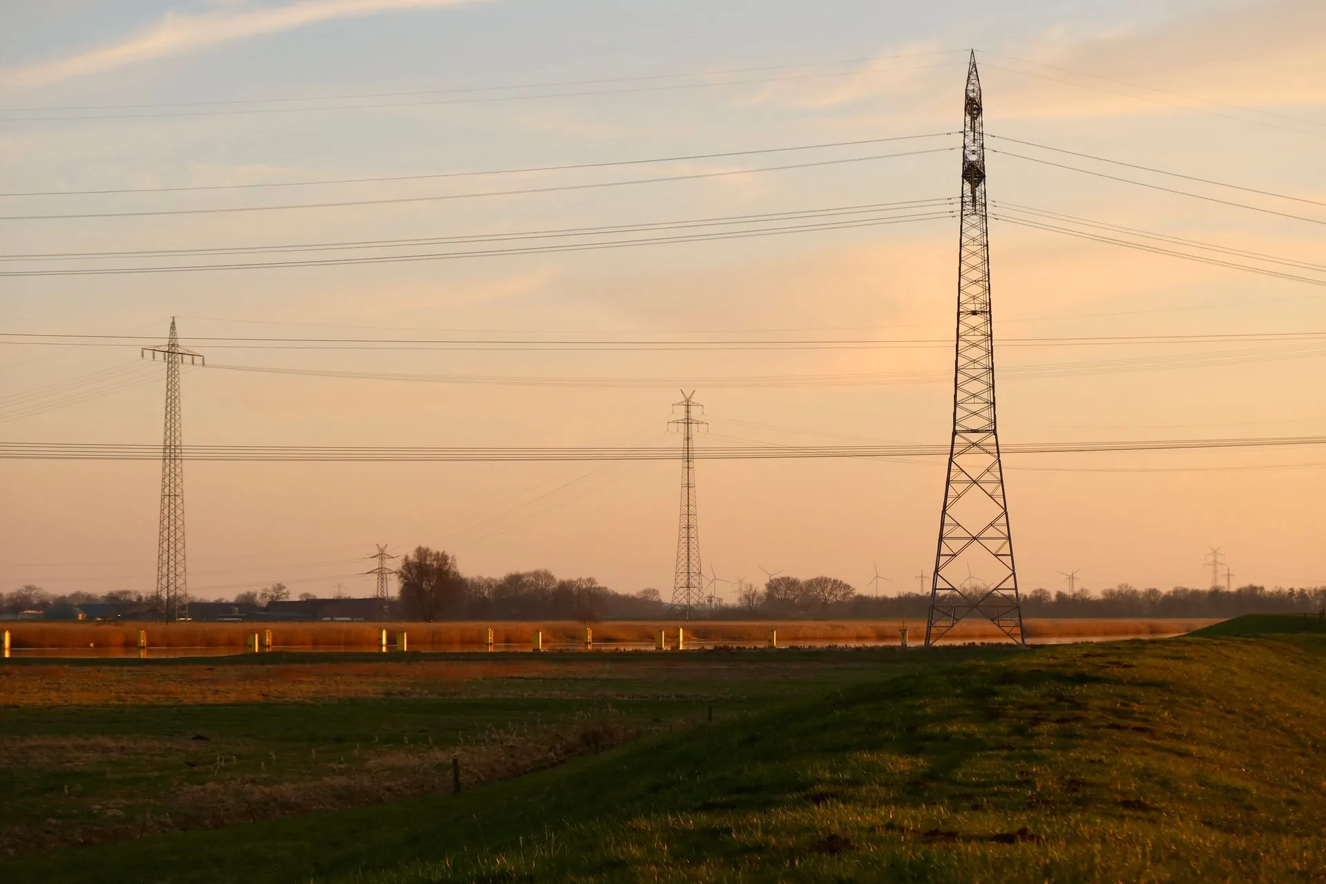 Electricity transmission lines at sunset