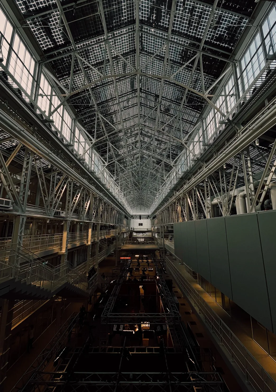 Steel framework and overhead infrastructure in an industrial facility
