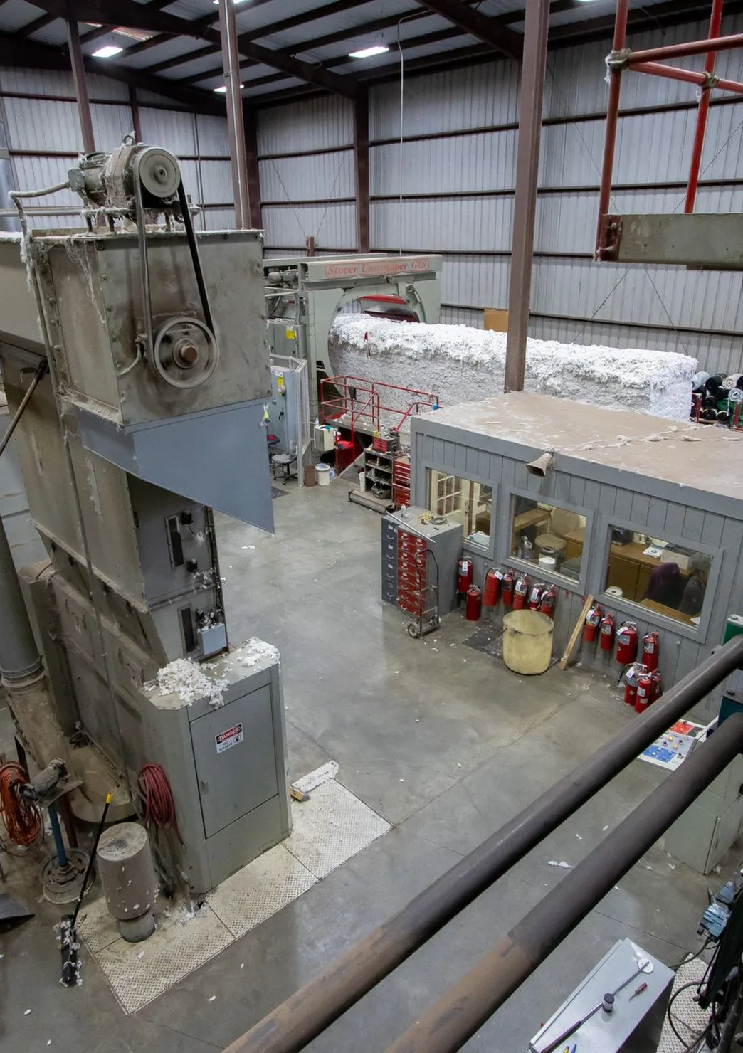 Lighting, equipment, and overhead infrastructure inside an industrial facility