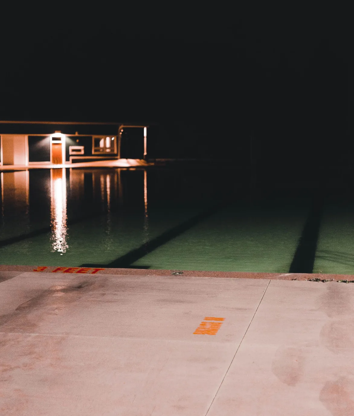 Swimming pool illuminated at night